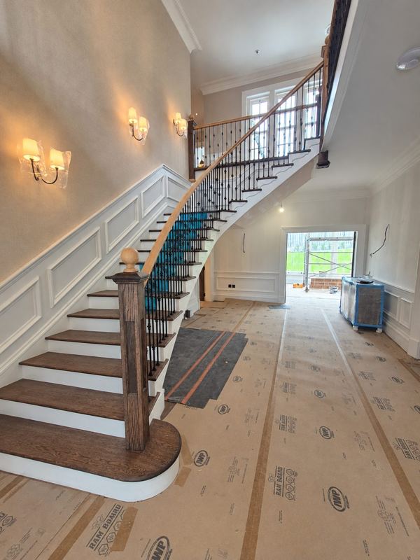 Sweeping curved staircase manufactured and fitted by G J Low Joinery