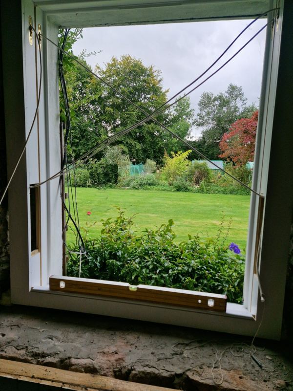 Fitting a new window frame into a period stone property
