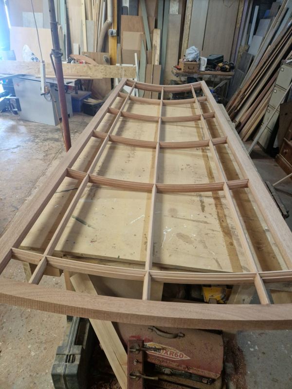 Curved on-plan window under construction in the workshop